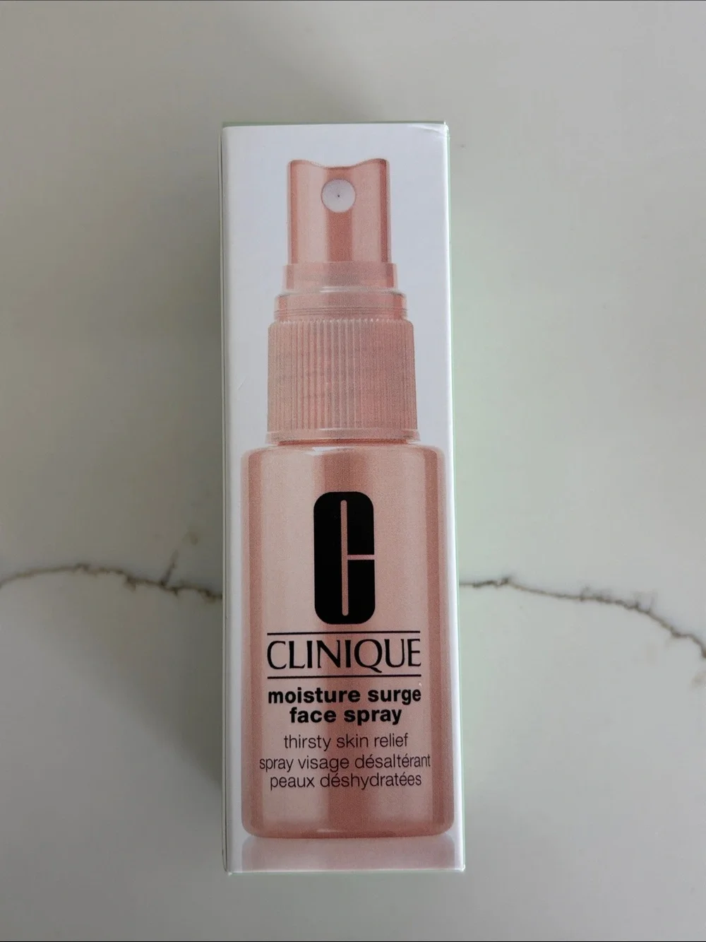 Clinique Moisture Surge Face Spray — Rose Pink Spray Bottle